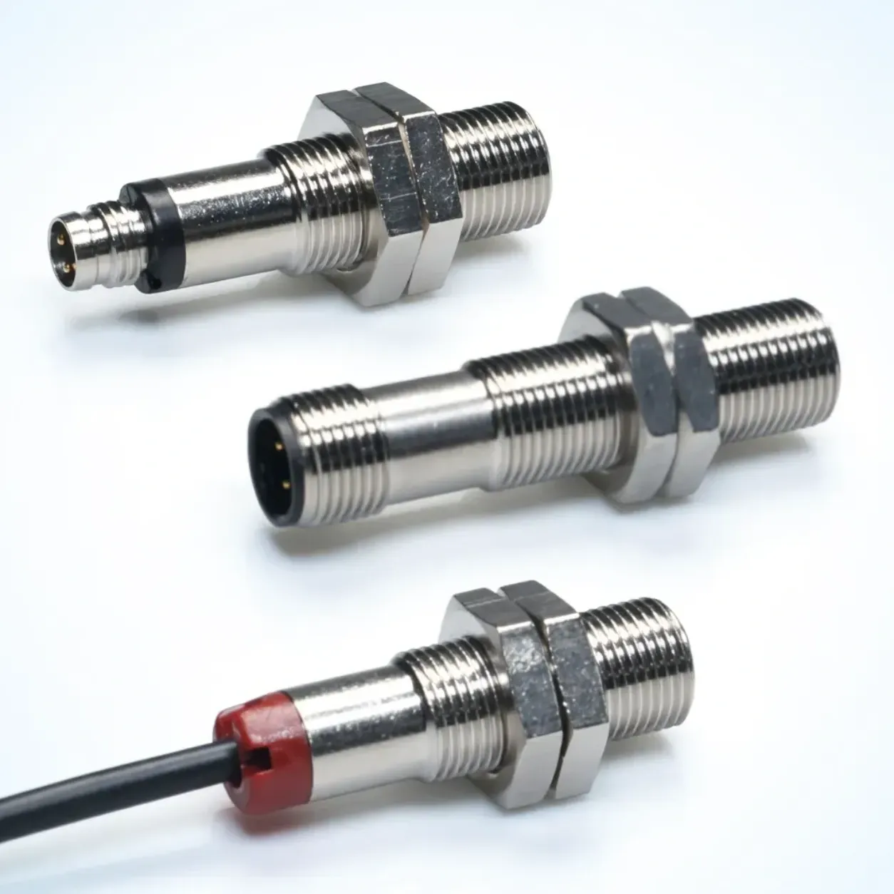 Inductive proximity sensor detecting glowing hot metal part near industrial furnace opening